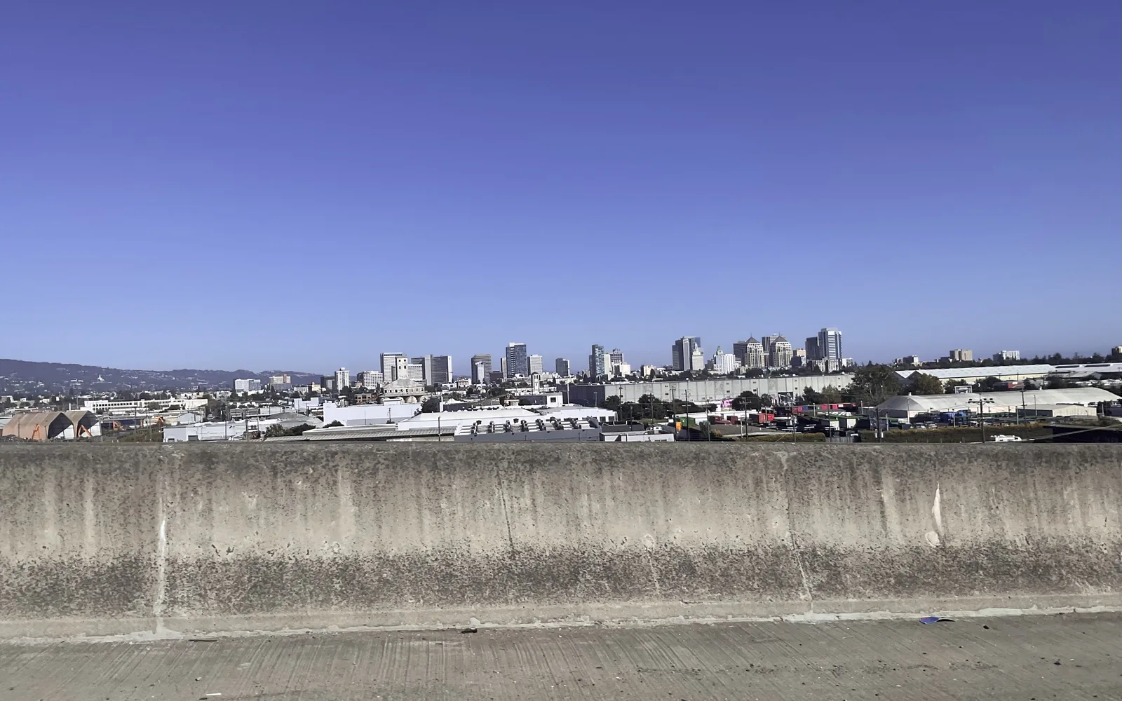 Oakland urban landscape and skyline viewed from the highway